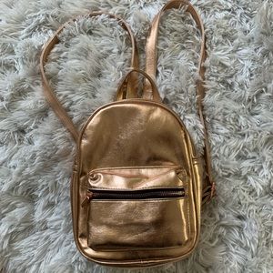 metallic rose gold mini backpack
